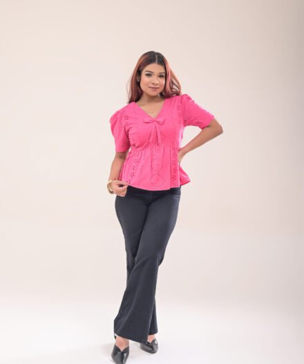 Pink Peplum Bow Top with V-neck and attached bow detail - front view